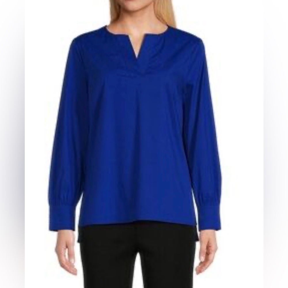 Ming Wang cobalt blue long-sleeve blouse with a V-neck and button cuffs.
